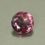 CCDragonGarnet round 6.4mm 1.27cts N cc431 secondary