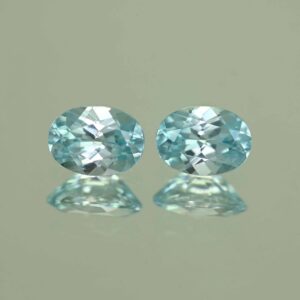 IceBlueZircon oval pair 7.5x5.5mm 2.98cts H zn7095 scaled 1