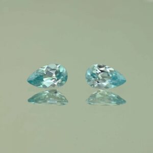 IceBlueZircon pear pair 8.0x5.0mm 2.19cts H zn7469 scaled 1