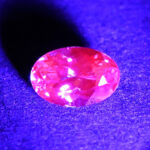 MalayaDragonGarnet oval 6.0x4.1mm 0.61cts N ma370 UV