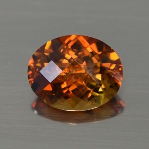 OrangeTourmaline ch oval 10.0x7.9mm 2.44cts tm1315
