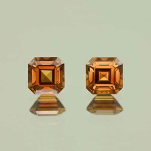 OrangeZircon sq eme cut pair 6.5mm 4.46cts N zn7623 scaled 1
