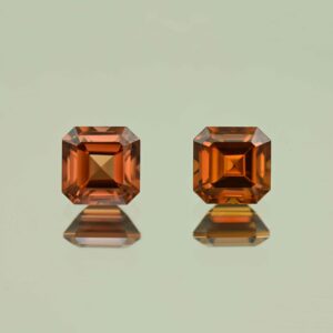 OrangeZircon sq eme cut pair 7.0mm 5.57cts N zn7629 scaled 1