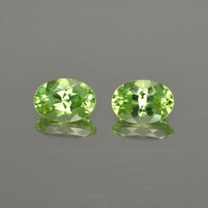 Peridot oval pair 7.0x5.0mm 1.85cts pe104