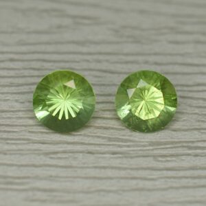 Peridot_round_pair_6.5mm_2.35cts_pe107.jpg