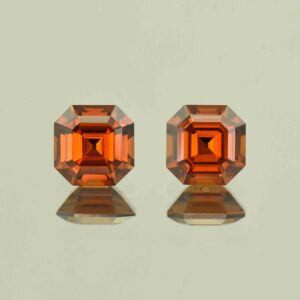 RedOrangeZircon sq eme cut pair 7.0mm 4.65cts N zn6635