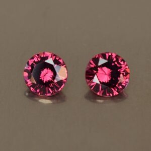 Rhodolite_round_pair_5.1mm_1.20cts_rh198.jpg