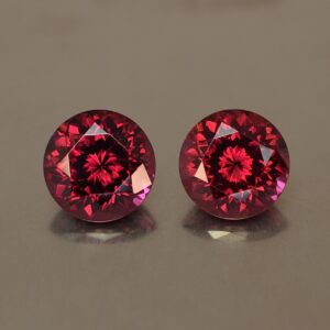 Rhodolite_round_pair_9.4_9.6mm_8.14cts_rh195.jpg