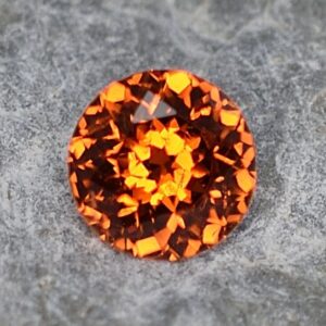 Spessartite round 5.0mm 0.57cts sg136 SOLD
