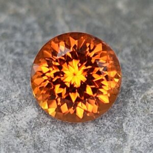 Spessartite round 5.0mm 0.73cts sg137 SOLD
