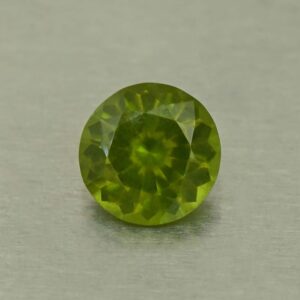 Vesuvianite round 6.4mm 0.99cts N vs328