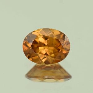 YellowOrangeZircon oval 8.5x6.5mm 2.21cts N zn7736