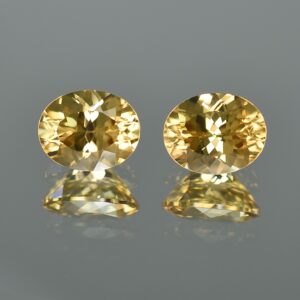 YellowZircon oval pair 10.1x8.1mm 8.69cts zn2203 SOLD