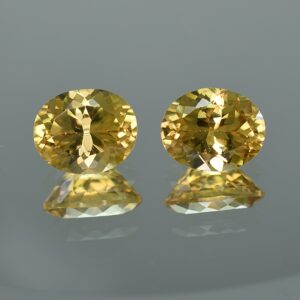 YellowZircon oval pair 11.0x9.0mm 11.46cts zn388