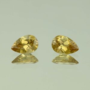 YellowZircon pear pair 9.0x5.9mm 3.33cts H zn3790